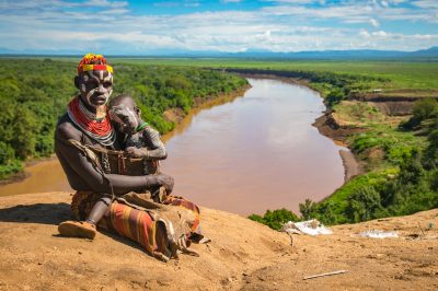 Karo mother and child sitting along the banks of the Omo River in the Kortcho Village.  There is a factory off to the right side of the photo.

Taken in November 2017

Photographer:  Kelly Fogel